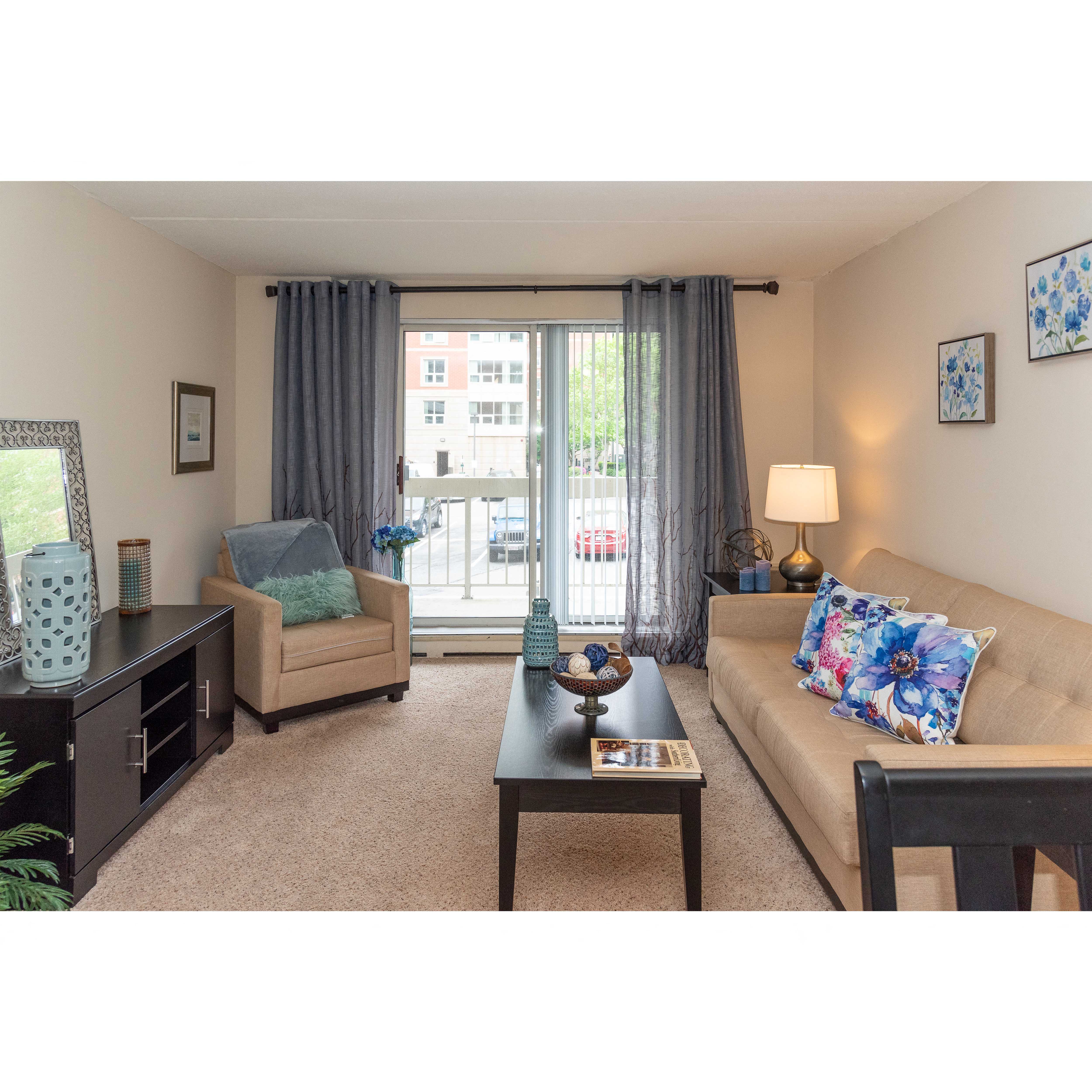 a living room with a couch and a table